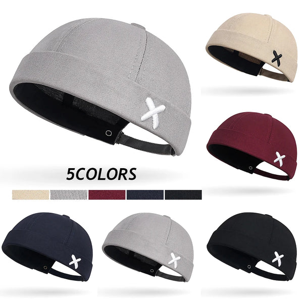 Brimless docker hat in black featuring customizable adjustable sizing