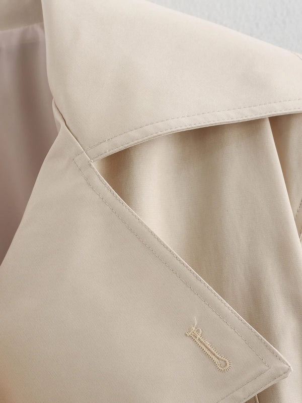 Classic short trench coat featuring adjustable waist tie