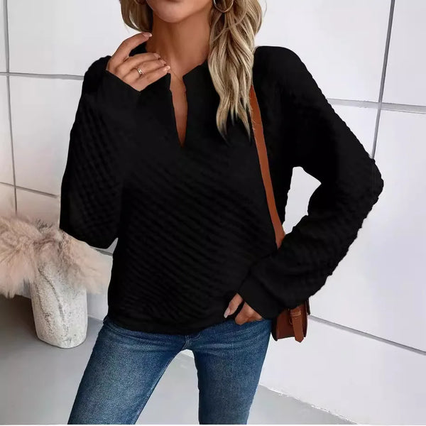 Medium-weight knit hoodie with deep V-neck and relaxed silhouette