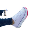 Side view of navy blue canvas sneakers with classic silhouette