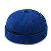 Urban Edge brimless hat in black with subtle embroidery detail