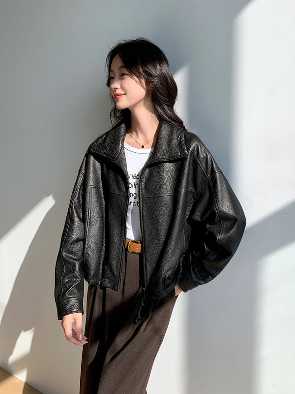 Stylish women's jacket in premium real sheepskin for autumn fashion.