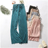 Chic wide leg summer pants for women in ice silk, pleated design, lightweight, breathable, and perfect for casual outings.