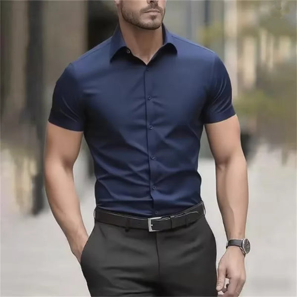 Professional man at networking event wearing versatile short sleeve stretch dress shirt