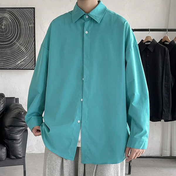 Oversized long sleeve casual shirt for men and women with Mandarin collar, perfect for spring and autumn fashion.
