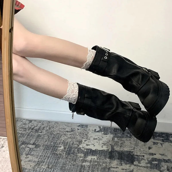 Chic women's mid-calf biker boots with buckle detail, zipper closure, and plush lining for comfort and style in winter.