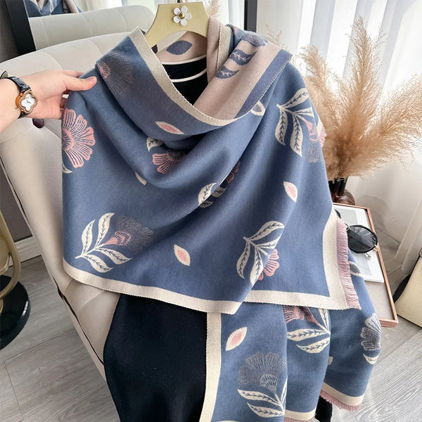 Designer-inspired leaf-print shawl scarf, offering warmth and elegance for women.