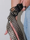 Unisex punk belt with square beads and triple grommets, perfect for edgy fashion and versatile styling for men and women.