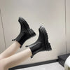 Chic women's Chelsea boots with thick sole, slip-on design, and durable rubber outsole for stylish autumn and spring wear.
