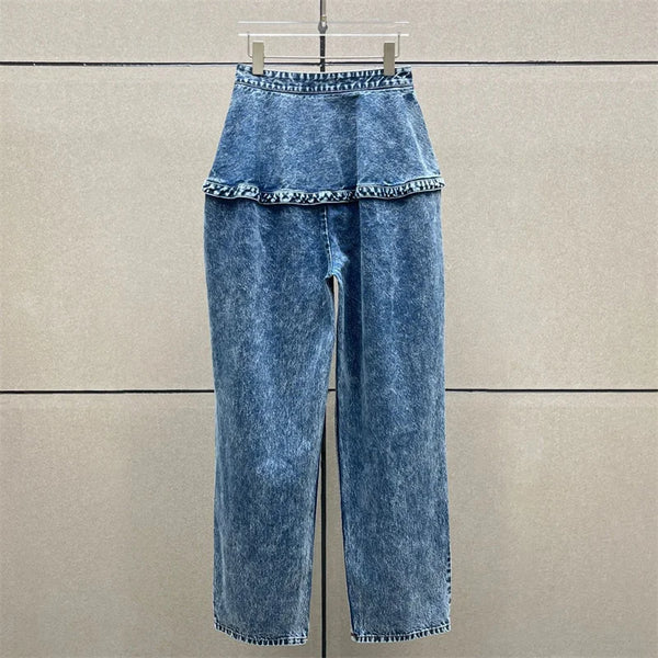 Wide leg cotton jeans with Y2K inspired distressed wash and relaxed fit silhouette