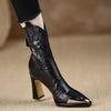 High heel square toe ankle boots in shiny black patent leather with side zipper