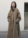 Long belted wool blend trench coat with turtleneck and single-breasted closure