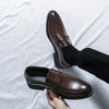 Chic black loafers that elevate any business casual outfit.