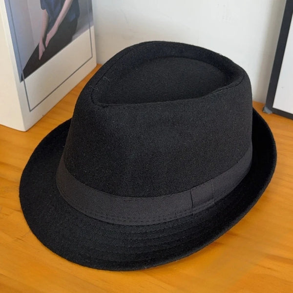 Versatile black wool hat, perfect for any winter occasion.