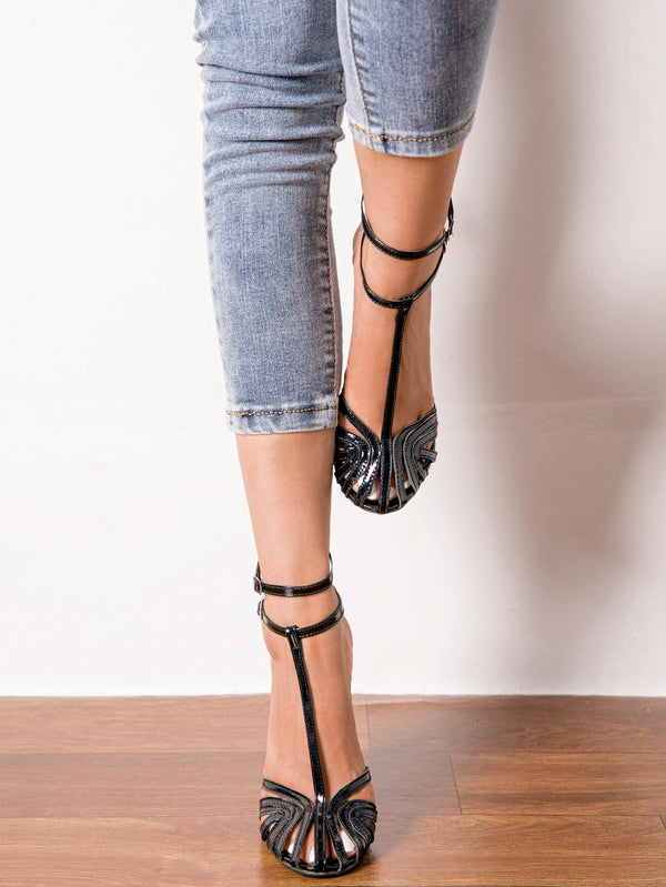 Fashion-forward lace-up sandals ideal for upscale gatherings.