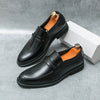 Classic black loafers that command respect in any setting.