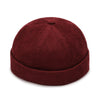 Black vintage docker cap detail highlighting embroidered accent