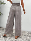 Floral wide-leg chiffon pants for women, ankle-length, elastic waist, perfect for summer fashion and casual chic outfits.