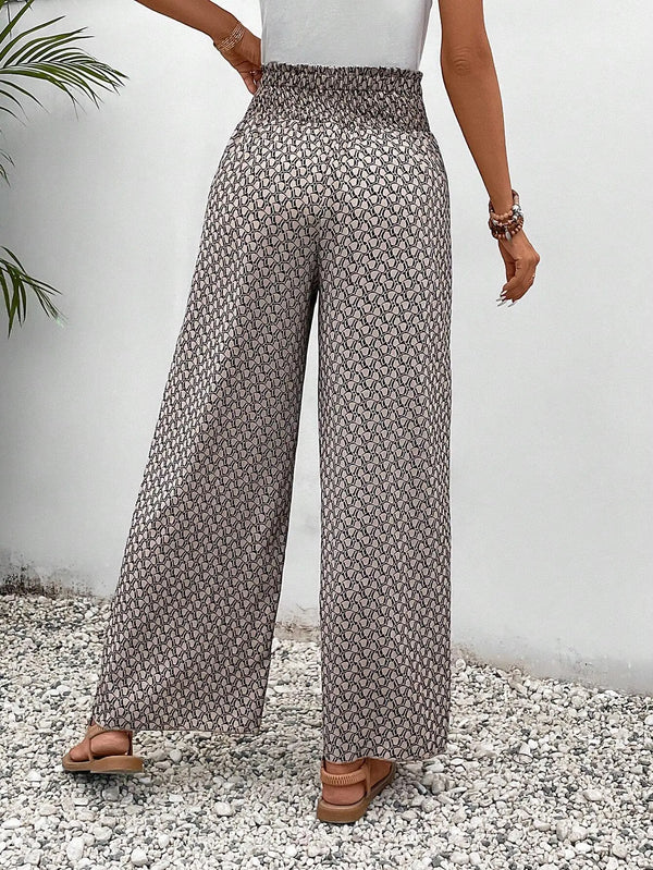 Floral wide-leg chiffon pants for women, ankle-length, elastic waist, perfect for summer fashion and casual chic outfits.