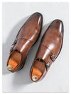 Pair of leather monk strap oxfords with durable rubber outsole