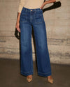 Chic high-waisted wide-leg jeans for women, featuring a relaxed fit, pockets, and subtle distressed details for stylish comfo