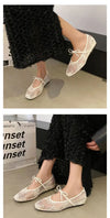Beige square-toe ballet flats with bow detail ideal for European getaways and city walks