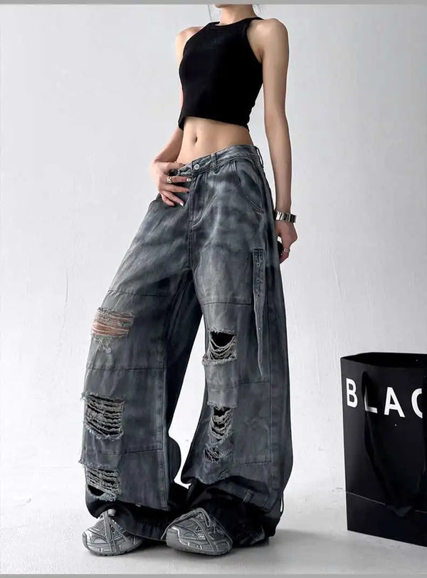 Trendy high-waist wide-leg ripped jeans for women with tie-dye and distressed detailing, perfect for casual street style.