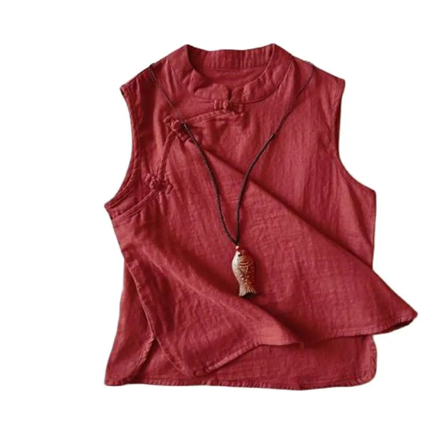 Sleeveless linen top featuring side slits for modern movement.
