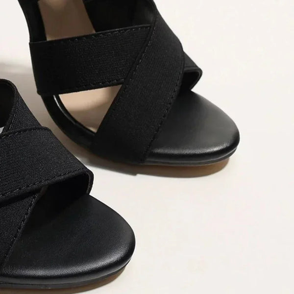 Fashion-forward blue stiletto heels with easy zip closure, ideal for evening events.