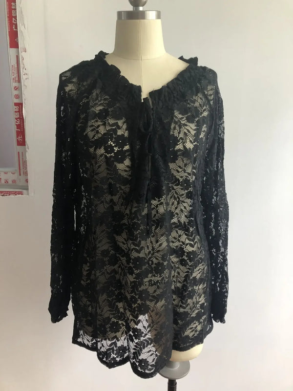 Elegant Boho Lace V-Neck Blouse for women, featuring delicate lace, relaxed fit, and lightweight fabric for casual sophistica