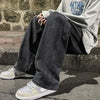Elastic waist wide-leg jeans for men in durable black denim fabric