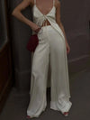 Close-up of premium synthetic satin fabric in crisp white with elegant sheen
