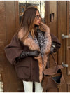 Relaxed oversized silhouette draping beautifully on plush jacket
