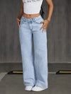 Chic wide-leg denim jeans for women, featuring a button-fly closure and light distressing for stylish everyday wear.