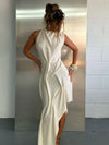 Romantic ruched halter maxi dress with asymmetrical silhouette in elegant flowing fabric