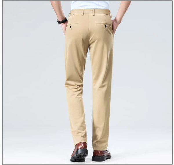 Black stretch business pants with flat front design and secure zipper closure