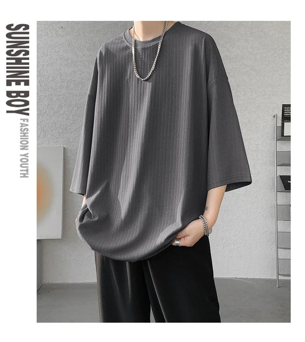 Close-up of the easy pull-on style of striped summer tee, designed for convenience.