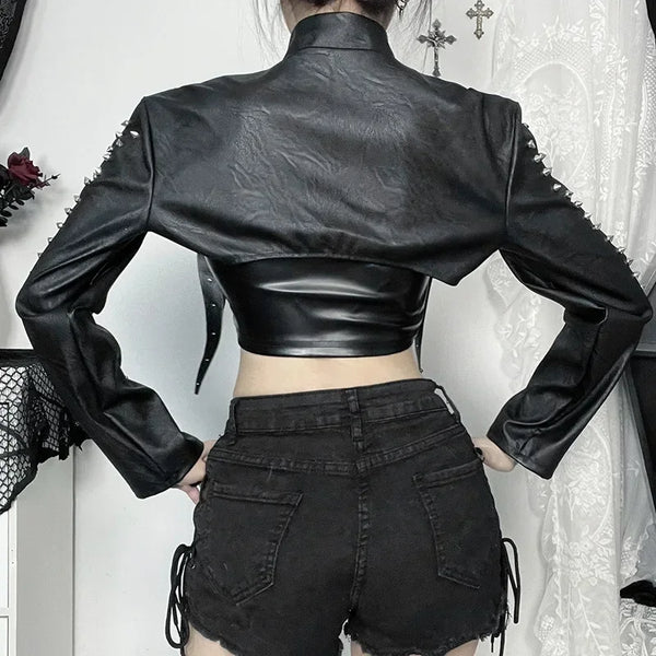 Chic cropped faux leather biker jacket for women with rivet detailing, slim fit, and zip closure for edgy style.