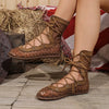 Close-up of breathable mesh knit texture on modern lace-up ankle boots with cushioned insole