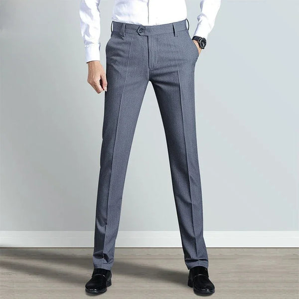 Elegant slim fit men's suit trousers in black, perfect for business attire and formal occasions, crafted from cotton-polyeste