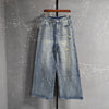 Wide leg men's jeans in washed blue featuring vintage-style finish