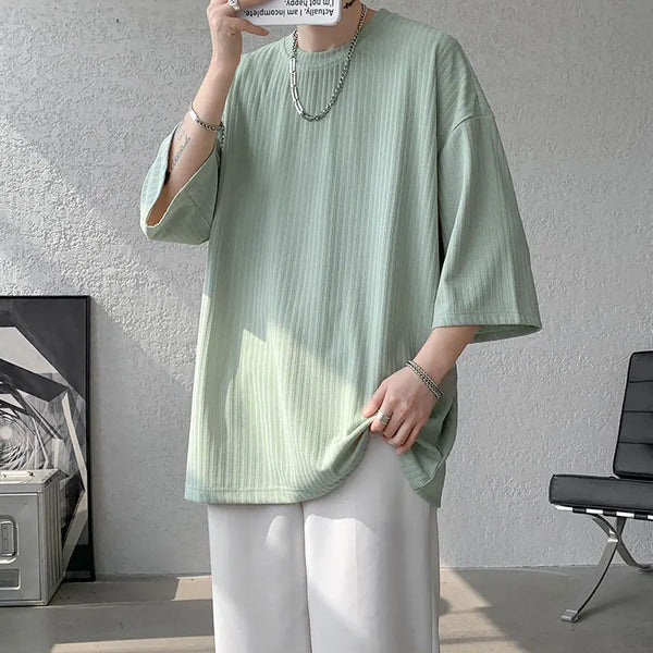 Close-up of classic striped pattern on comfy summer tee, perfect for casual wear.