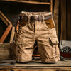 Modern cargo shorts combining durable construction with distinctive patchwork style