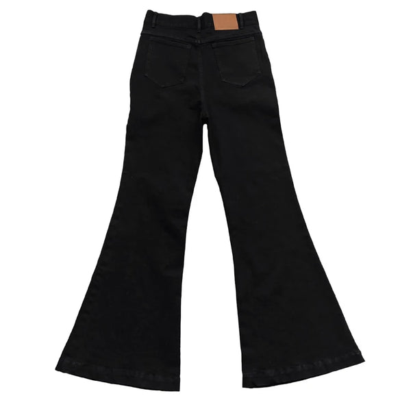 Back view of Midnight Voyager jeans emphasizing contoured fit and style.