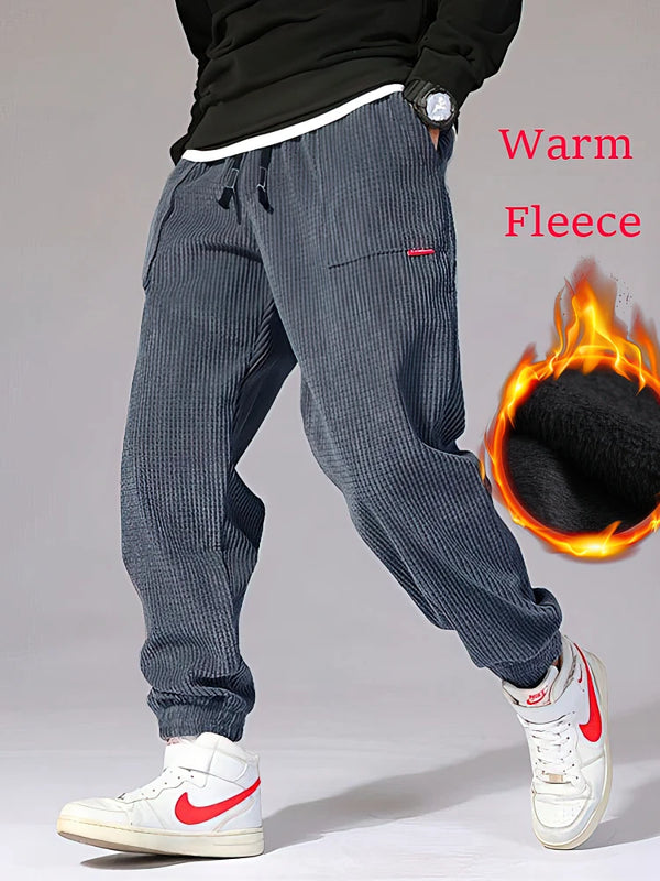 Person wearing thermal corduroy joggers with sneakers for casual comfort