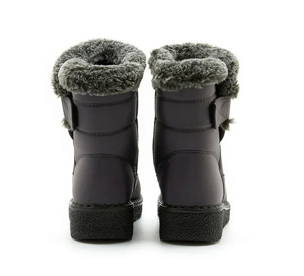 Chic women's waterproof winter boots with plush lining, low heel, and durable design for stylish cold-weather comfort.