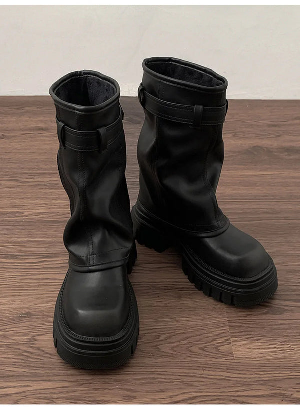 Chic women's mid-calf biker boots with buckle detail, zipper closure, and plush lining for comfort and style in winter.