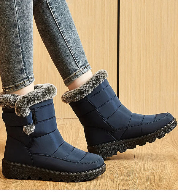 Chic women's waterproof winter boots with plush lining, low heel, and hook-and-loop closure for stylish cold weather comfort.