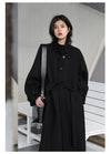Polished trench coat in warm wool polyester with elegant belt detail