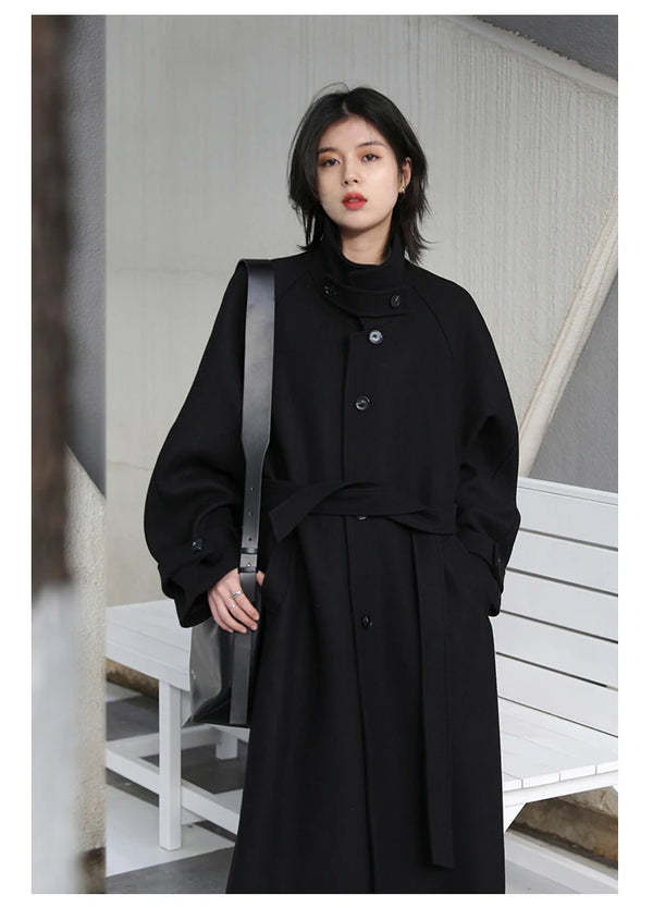 Polished trench coat in warm wool polyester with elegant belt detail
